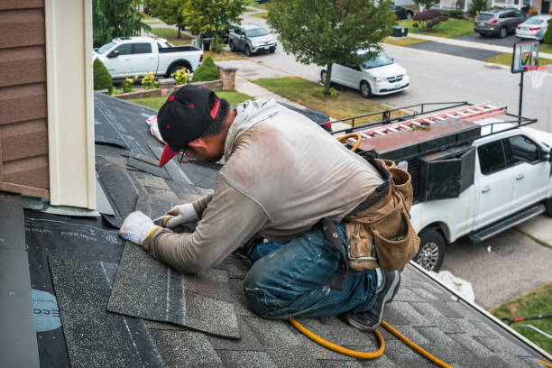 Professional Roof Replacement technician working in Spangler, PA